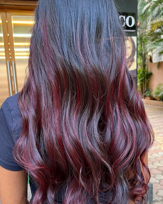 10. Dark Root Burgundy Balayage with Natural Waves - Burgundy Hair Color