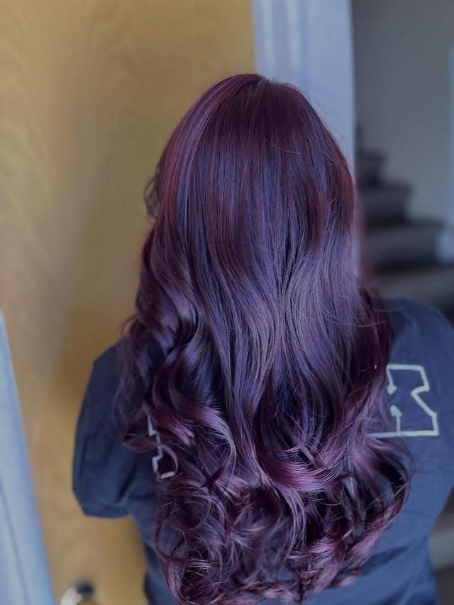 13. Curled Mid-Length Style in Cool-Toned Burgundy - Burgundy Hair Color