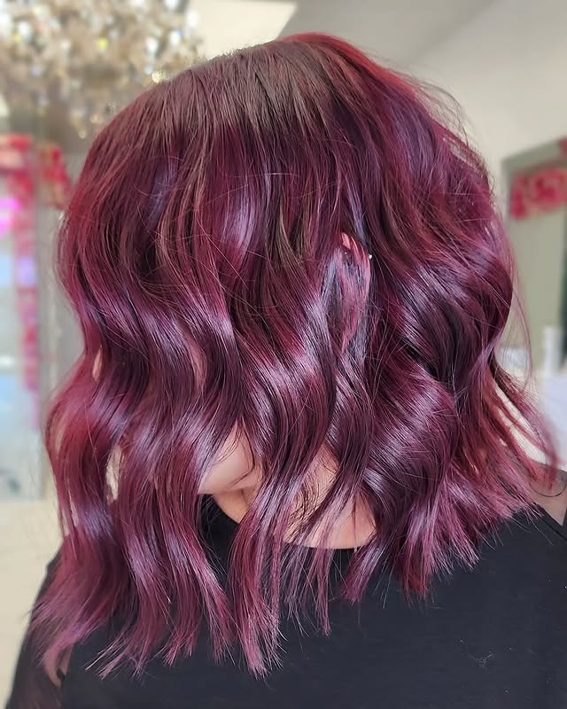 17. Shoulder-Length Wavy Cut in Berry Burgundy - Burgundy Hair Color