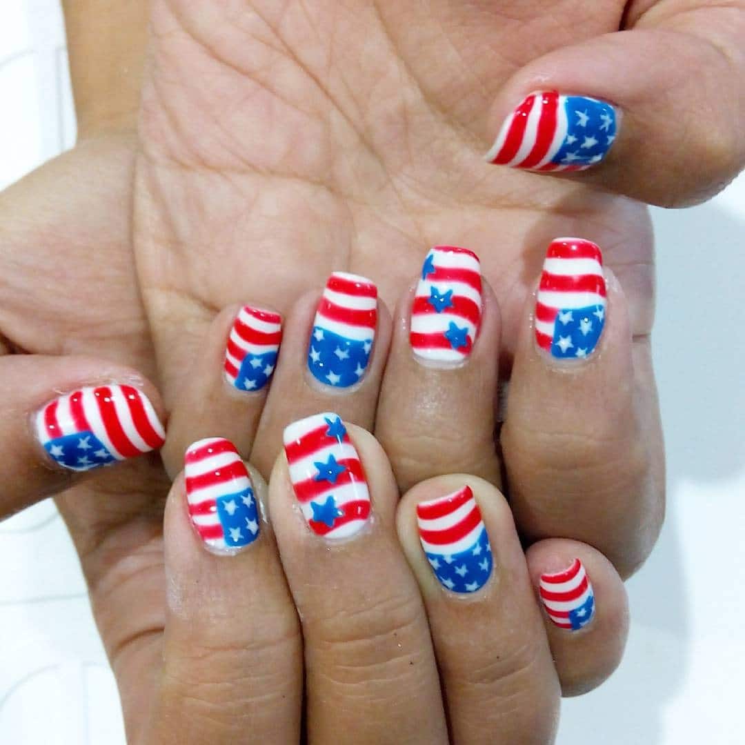 1. Classic Americana Stripe & Star Nails - us flag nail ideas