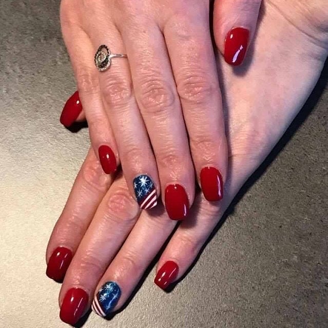 3. Deep Red Nails with Single Flag Statement - us flag nail ideas