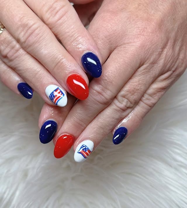 12. Navy and Red Almond Nails with Flag Accents - us flag nail ideas