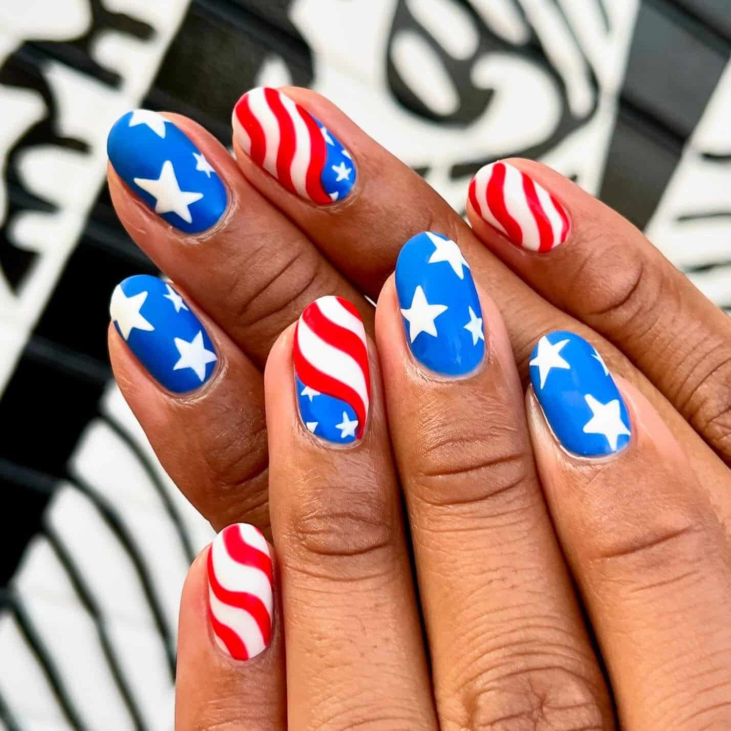 20. Graphic Star and Wave Stripe Nails - us flag nail ideas