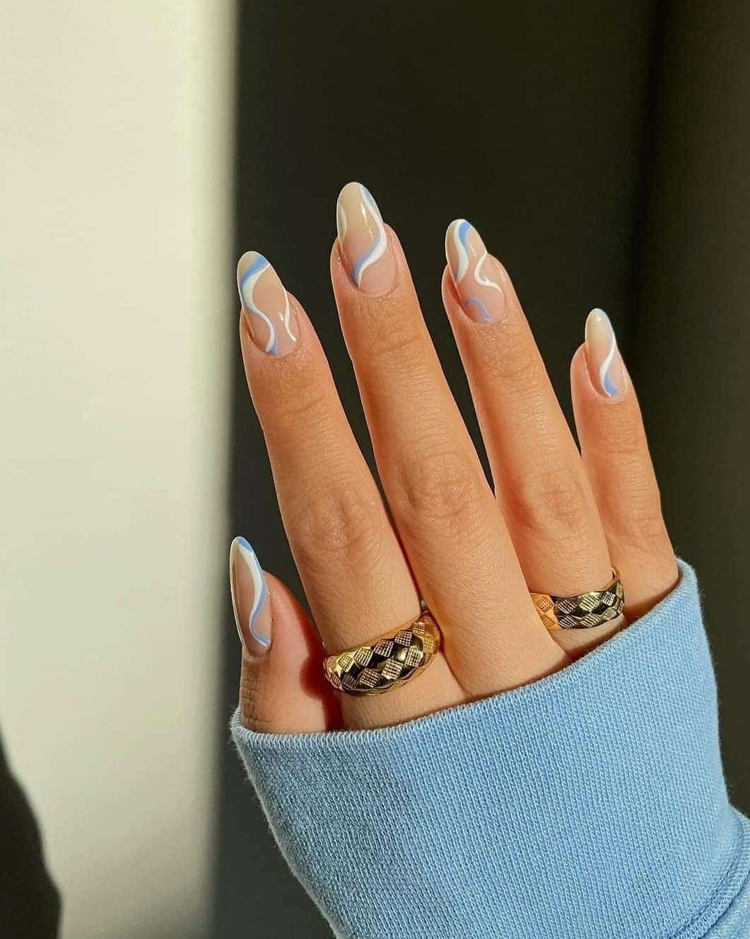 7. Minimal Blue Line Wave Nails - wavy nail ideas