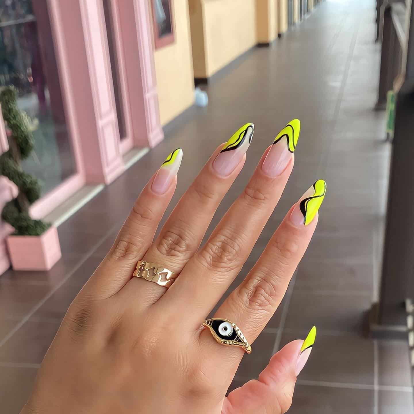 13. Neon Yellow and Black Wave Tips - wavy nail ideas
