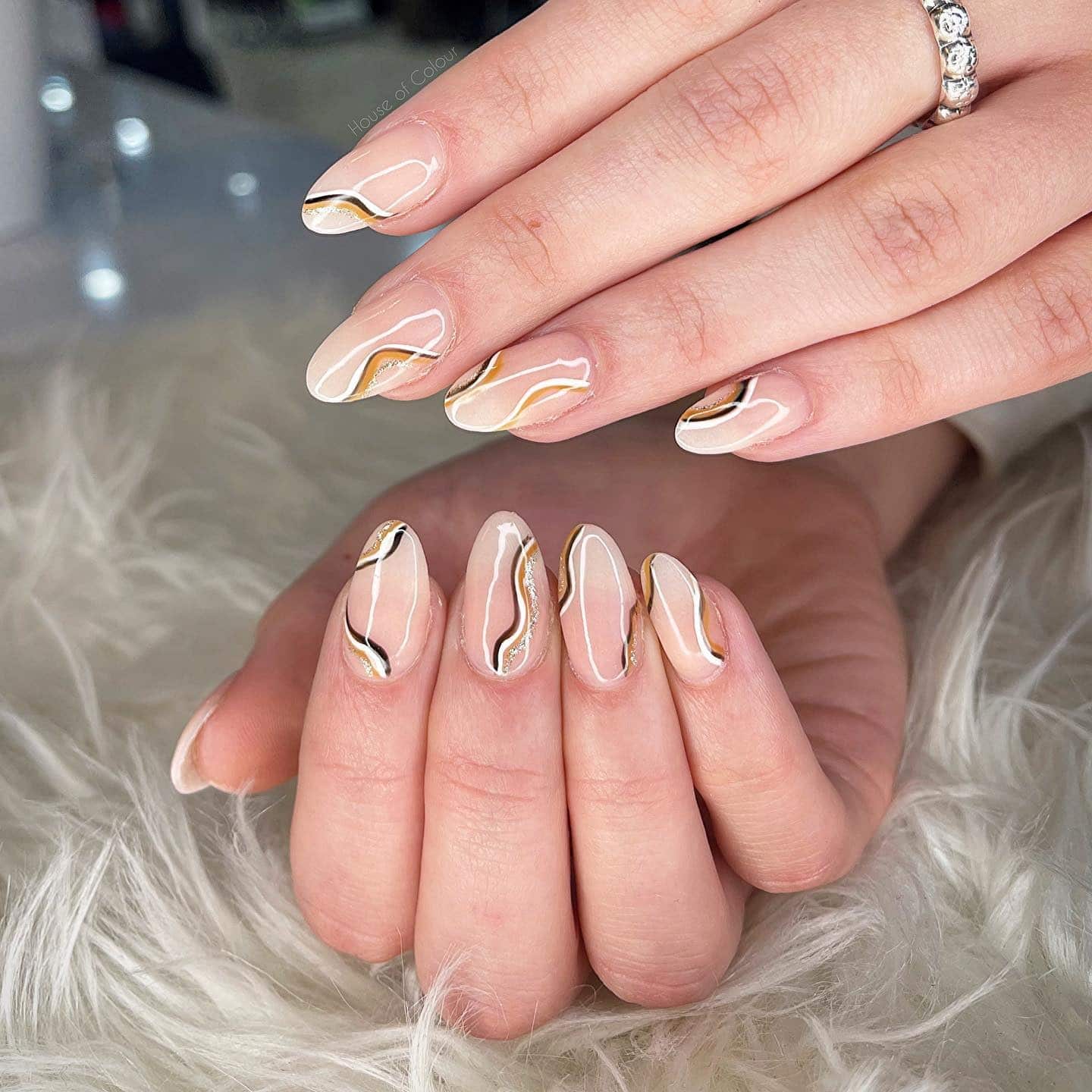 15. Neutral Gold Line Wave Nails - wavy nail ideas