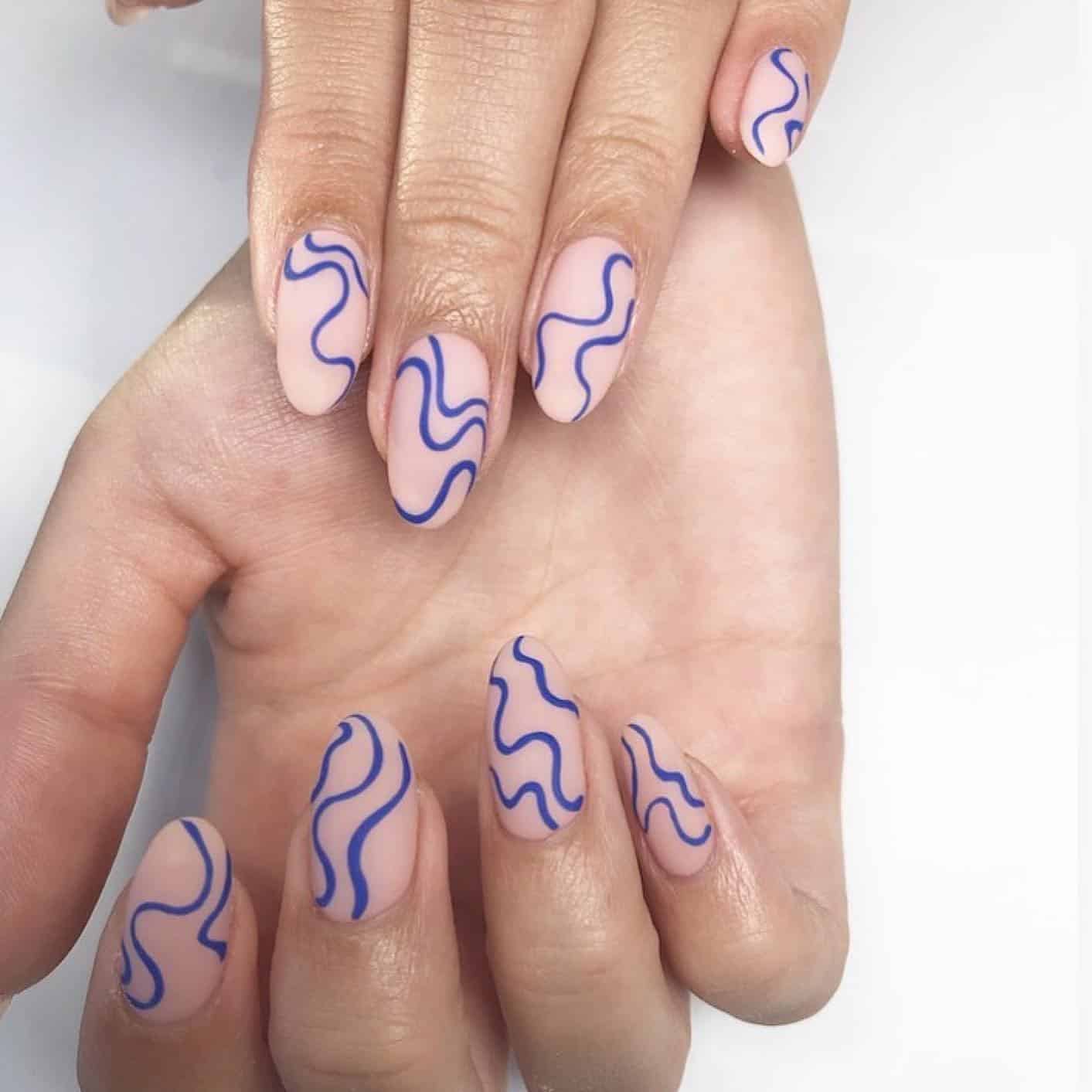 22. Soft Blue Micro French Almond Nails - white and blue nail ideas