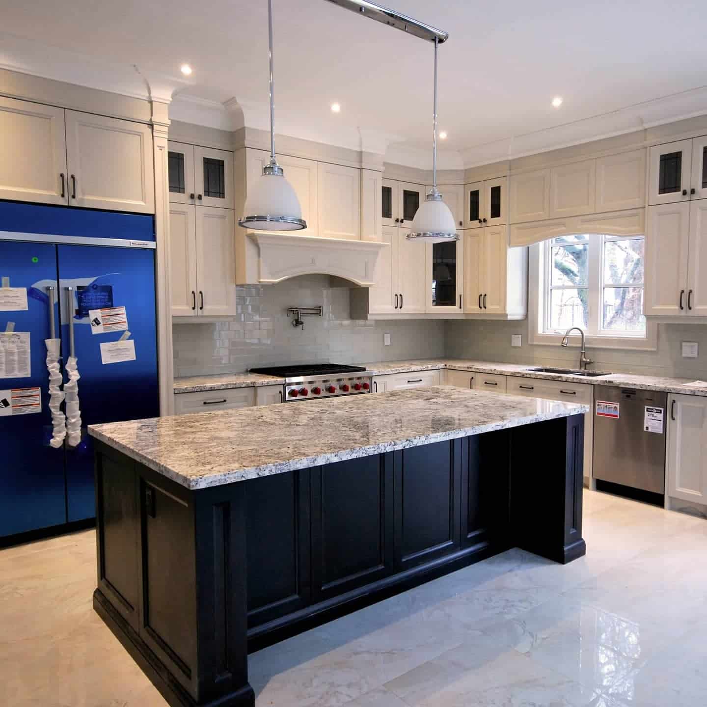 3. Traditional Statement Island in Black and Cream - rustic kitchen island ideas