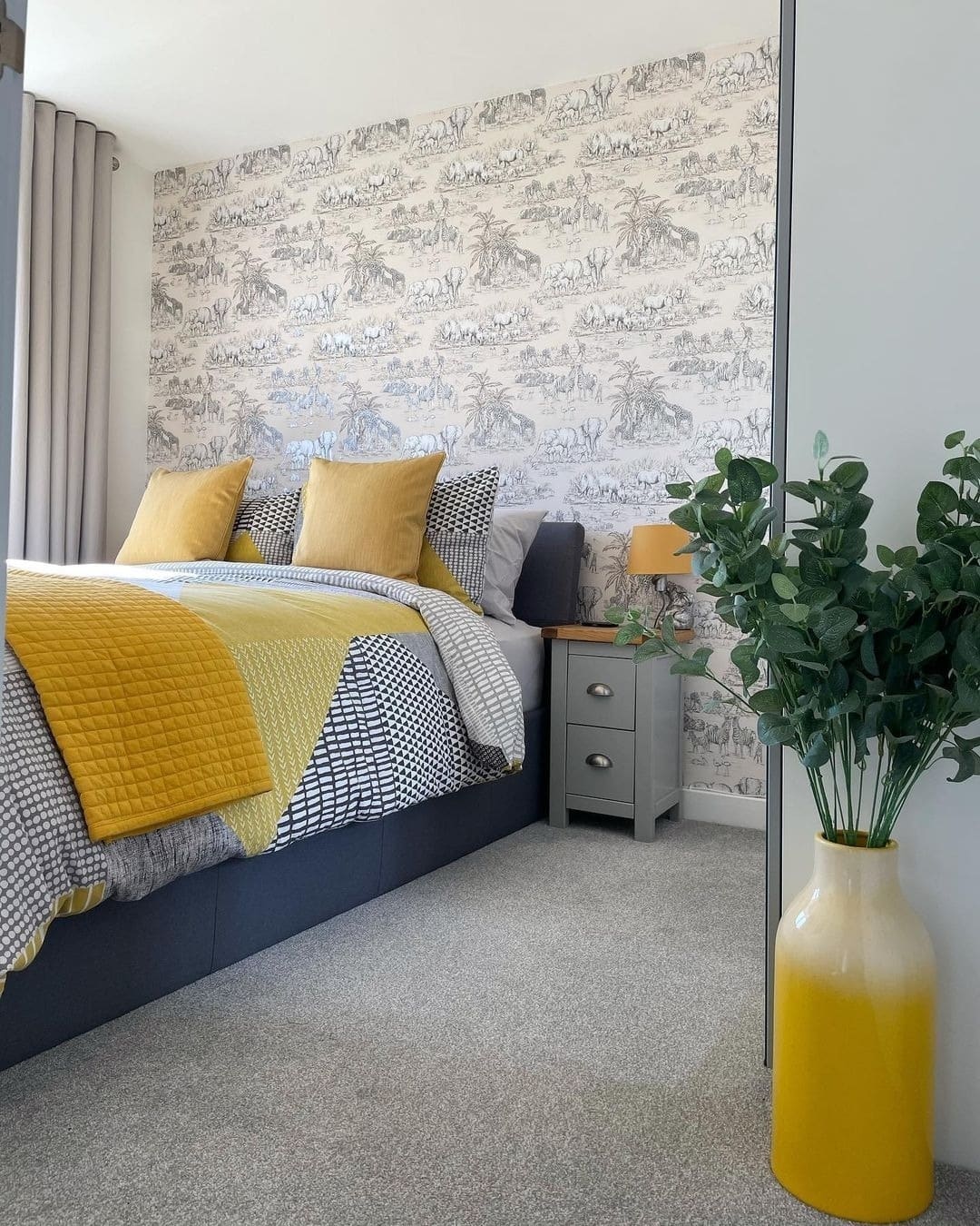 22. Patterned Yellow and Gray Bedroom with Textured Wallpaper - yellow and gray bedroom ideas