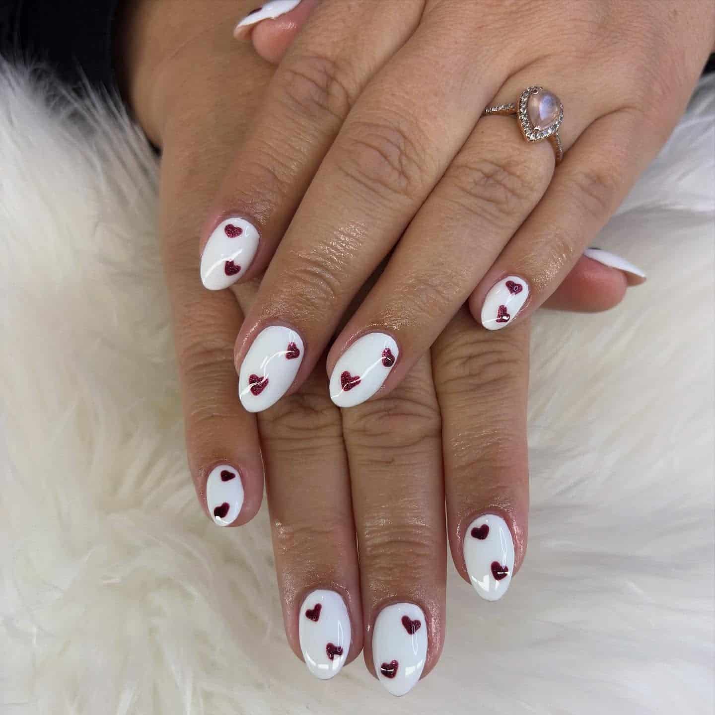 7. White Almond Nails with Red Heart Details - white almond nail ideas