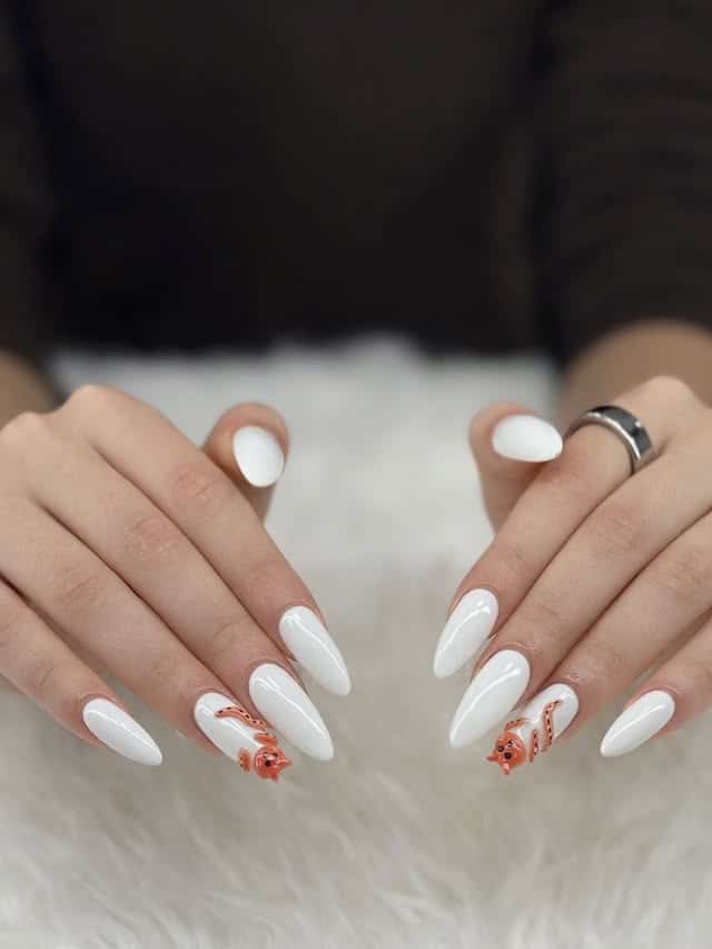 8. White Almond Nails with Mini Fish Art - white almond nail ideas