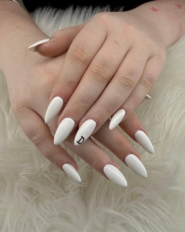 12. Solid White Almond Nails with Initial Detail - white almond nail ideas