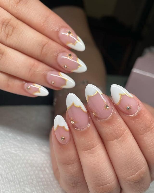16. White French Almond Nails with Gold Outline - white almond nail ideas