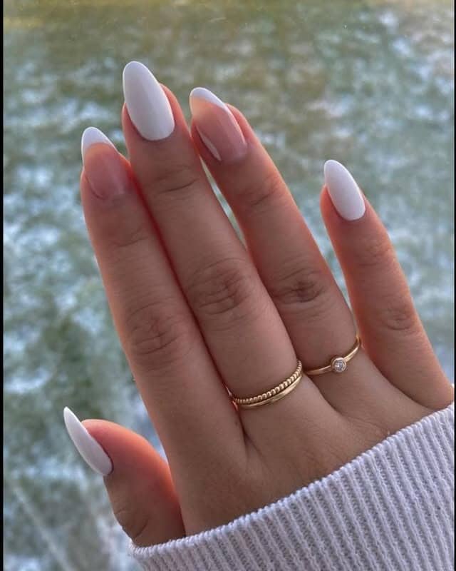 17. Milky White Almond Nails with Natural Finish - white almond nail ideas