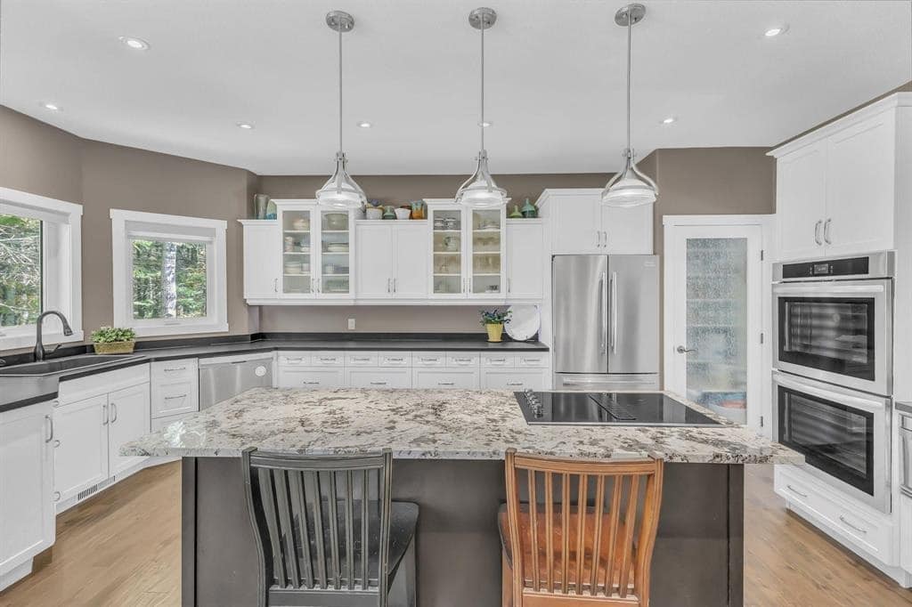 14. Neutral Granite Island with Coordinated Perimeter Counters - granite countertops kitchen ideas