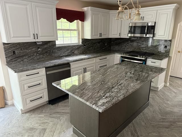 19. Linear Granite Pattern with Contemporary Cabinetry - granite countertops kitchen ideas