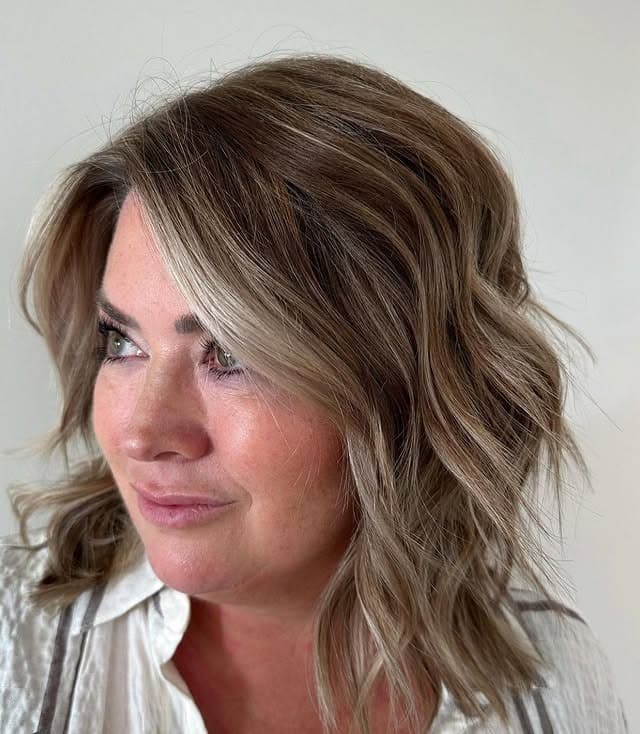 5. Textured Shoulder-Grazing Cut with Curtain Bangs in Beige Blonde - Short Layered Haircuts with Bangs