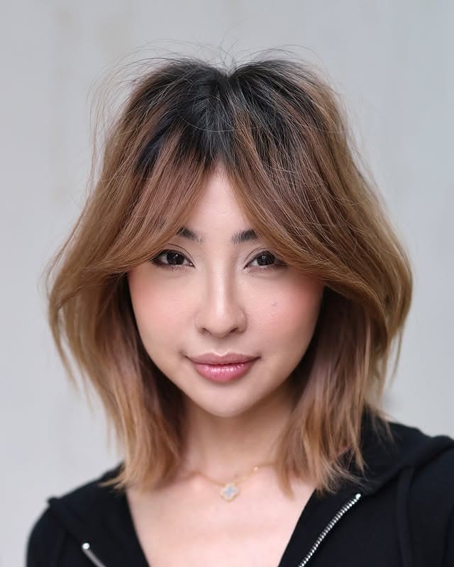 11. Soft Wolf Cut with Curtain Bangs in Warm Brunette - Short Layered Haircuts with Bangs