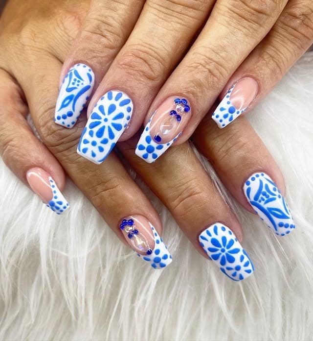 1. Blue Porcelain Floral Square Nails - white and blue nail ideas