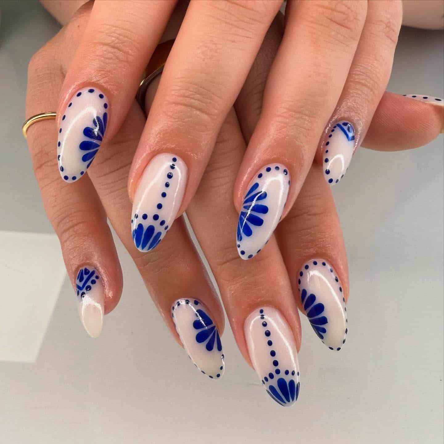 3. Classic Delft Almond Nails - white and blue nail ideas