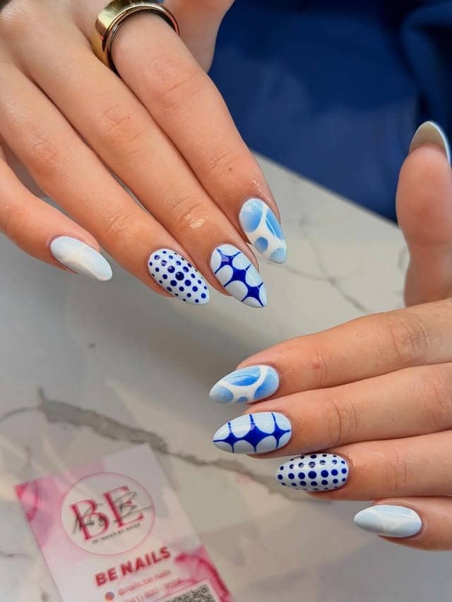 13. Blue Geometric Oval Nails - white and blue nail ideas