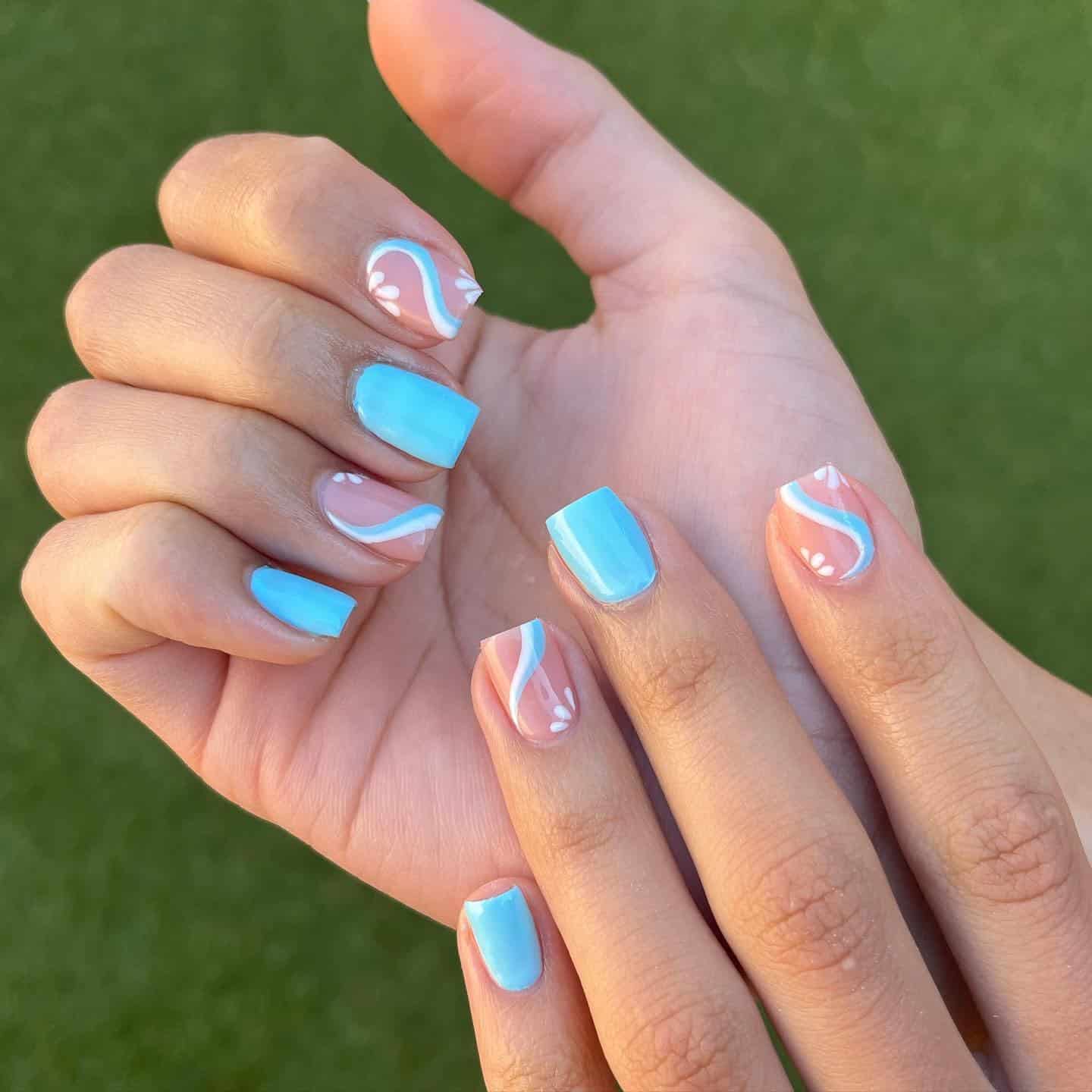 19. Light Blue Bow Detail Oval Nails - white and blue nail ideas