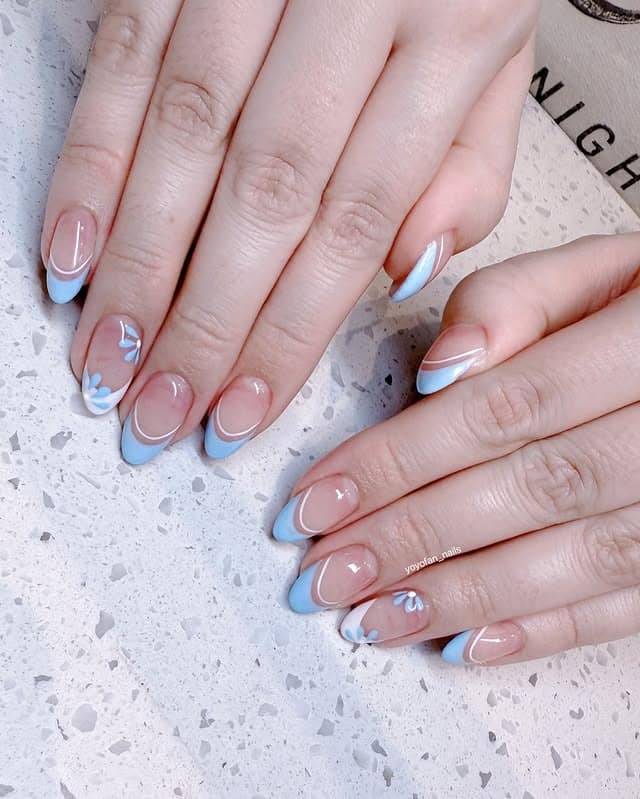 21. Baby Blue Floral Almond Nails - white and blue nail ideas