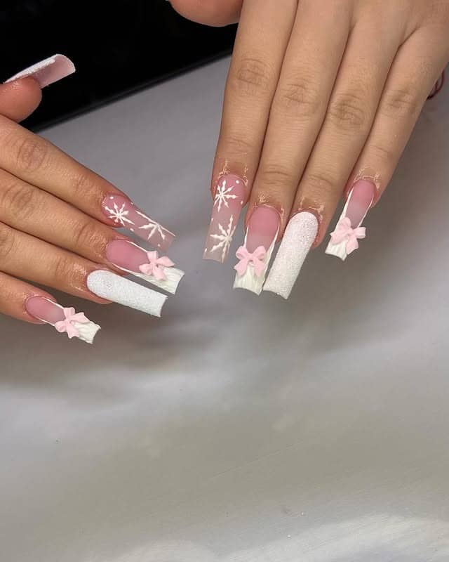 11. Pink Snowflake Bow Square Nails - white christmas nail ideas