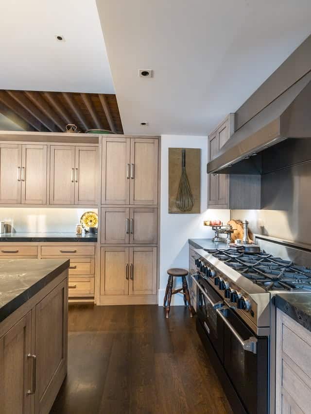 12. Modern Oak Kitchen with Warm Gray and Stainless Steel - oak cabinets kitchen ideas