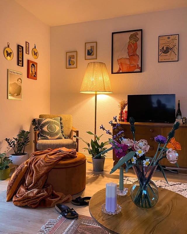 5. Eclectic Vintage Living Room with Warm Earth Tones - vintage living room ideas