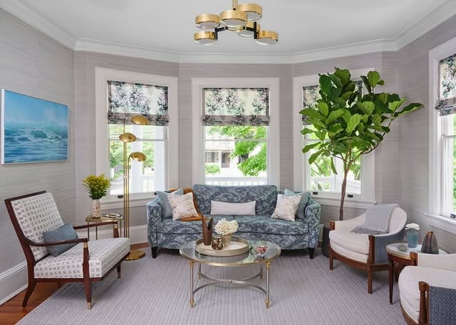 8. Traditional Bay Window Living Room in Soft Blue and Cream - vintage living room ideas