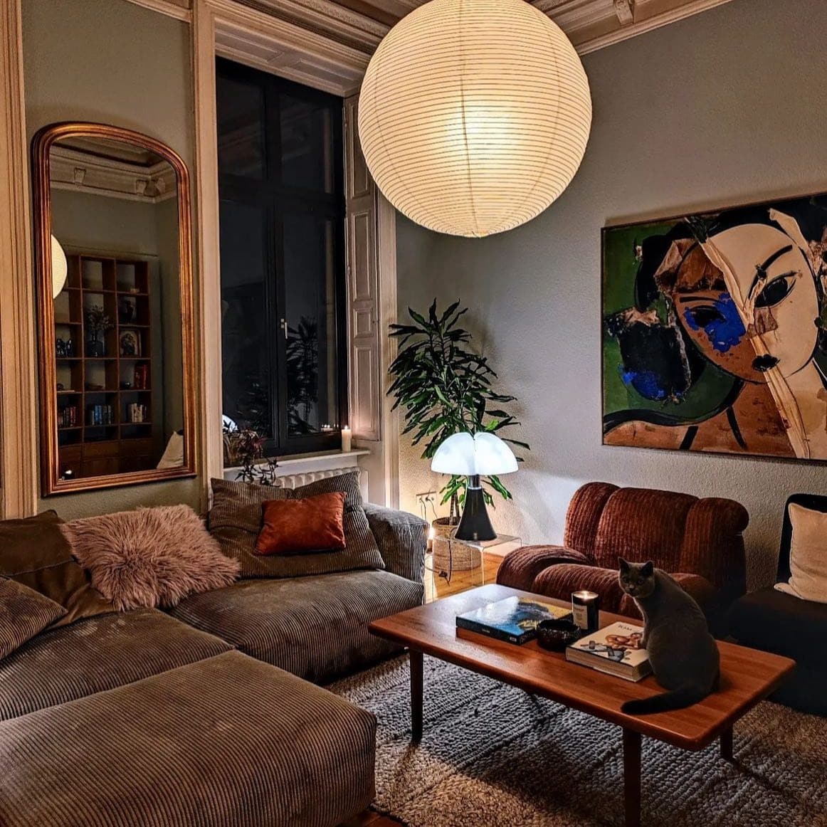 9. Moody Vintage Living Room in Charcoal and Warm Wood - vintage living room ideas