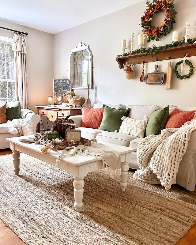 13. Cottage-Style Vintage Living Room in Cream, Olive, and Rust - vintage living room ideas