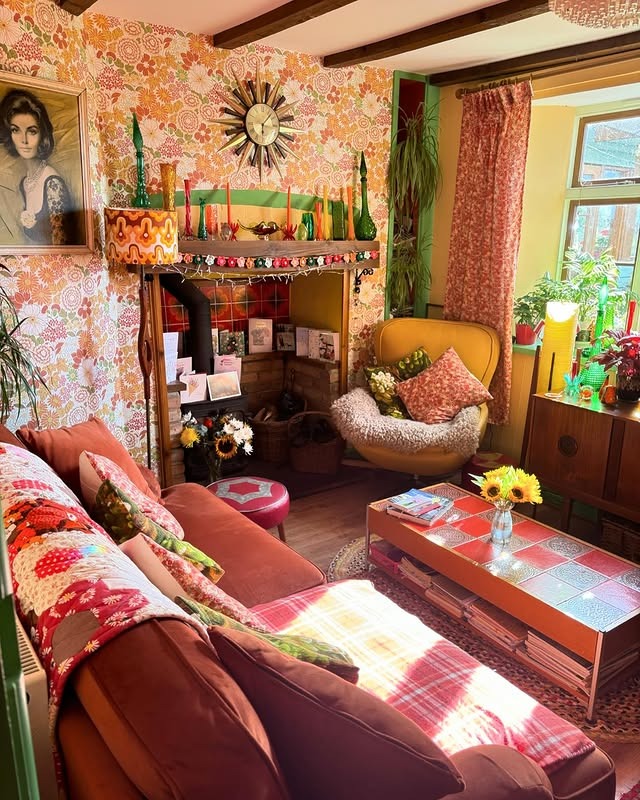 18. Eclectic Vintage Living Room in Patterned Florals and Warm Reds - vintage living room ideas