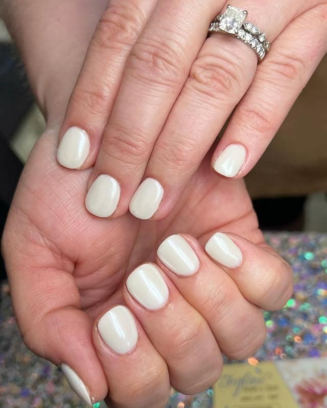 8. Short White Chrome Oval Nails - white chrome nail ideas