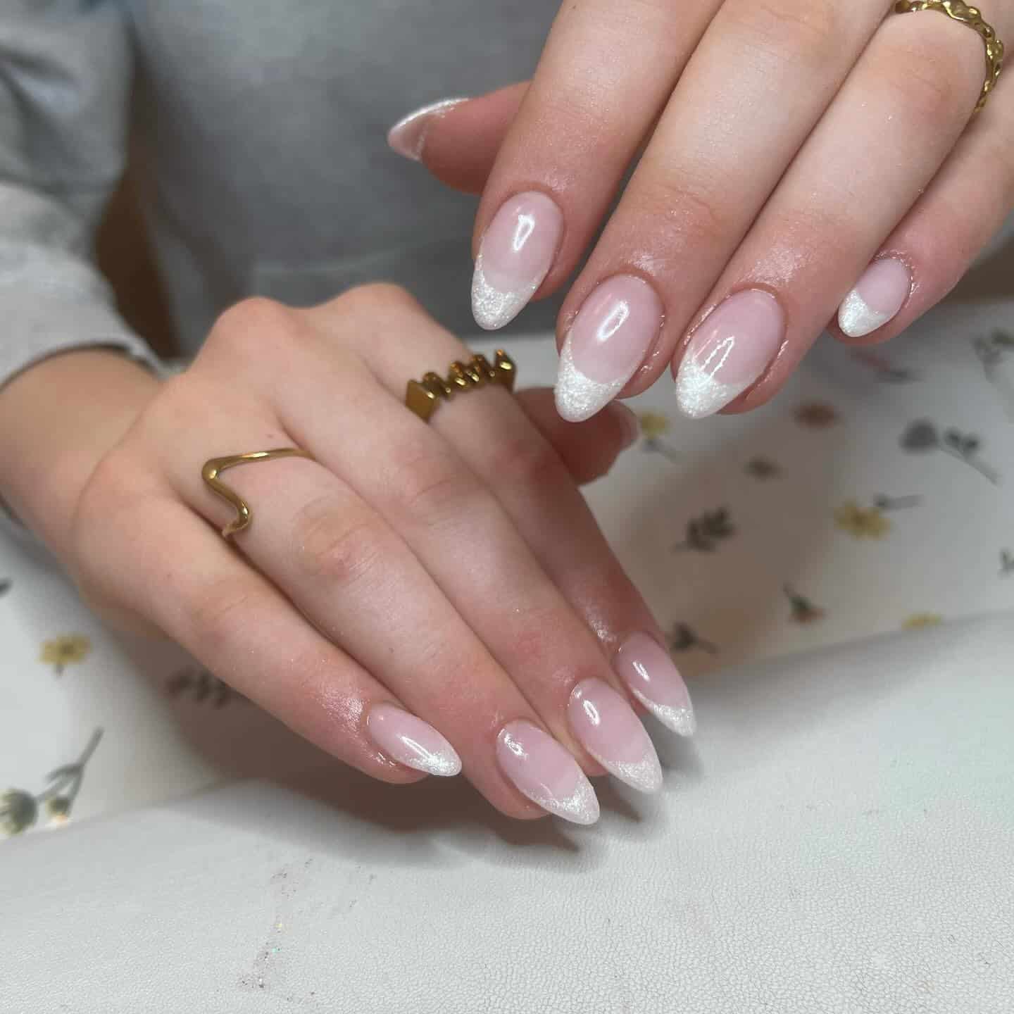 10. Soft French White Chrome Almond Nails - white chrome nail ideas
