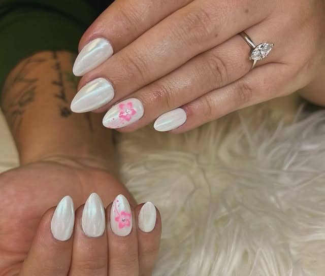 13. White Chrome Oval Nails with Floral Accent Art - white chrome nail ideas