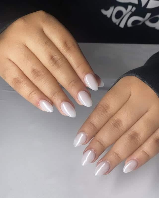 18. Soft White Chrome Almond Nails with Gloss Finish - white chrome nail ideas