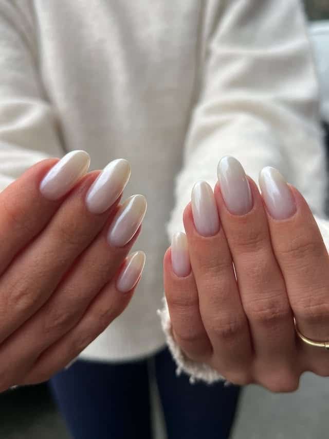 21. Soft White Chrome Oval Nails with Milky Finish - white chrome nail ideas