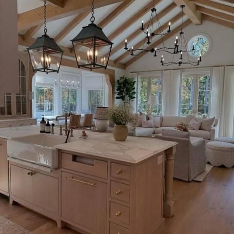 15. Open Farmhouse Kitchen with Soft Cream and Wood Tones - farmhouse kitchen ideas