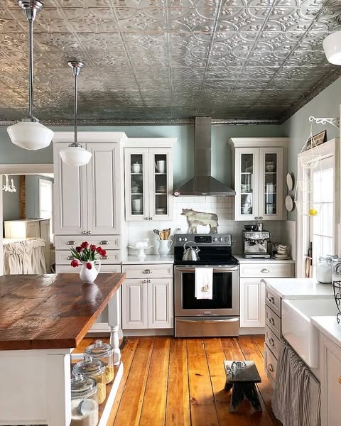 18. Vintage-Inspired Farmhouse Kitchen with Tin Ceiling - farmhouse kitchen ideas