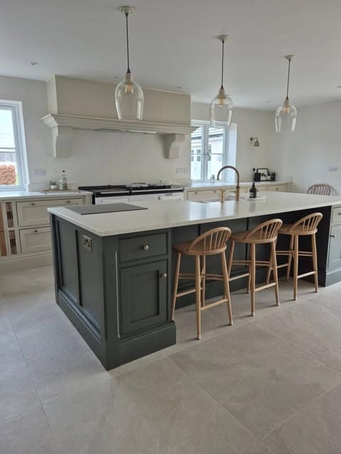 20. Neutral Farmhouse Kitchen with Gray Island and Light Wood - farmhouse kitchen ideas