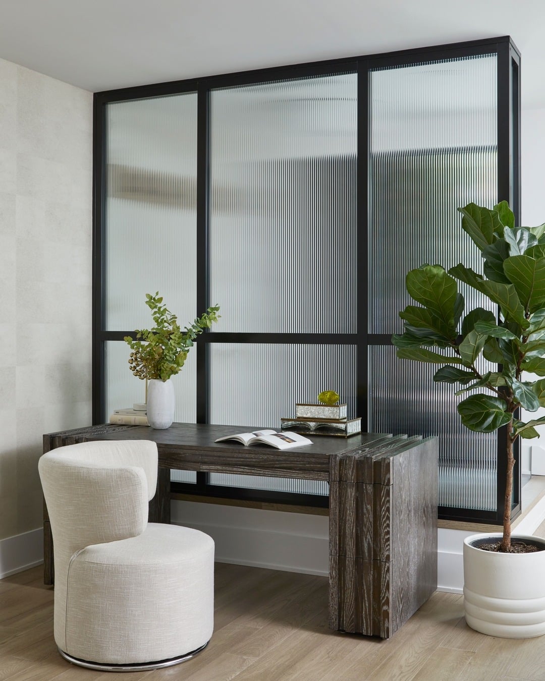 7. Modern Desk with Textured Glass and Soft Neutrals - simple home office ideas