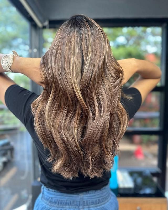 8. Sunlit Honey Brown Long Waves - Honey Brown Hair  Color