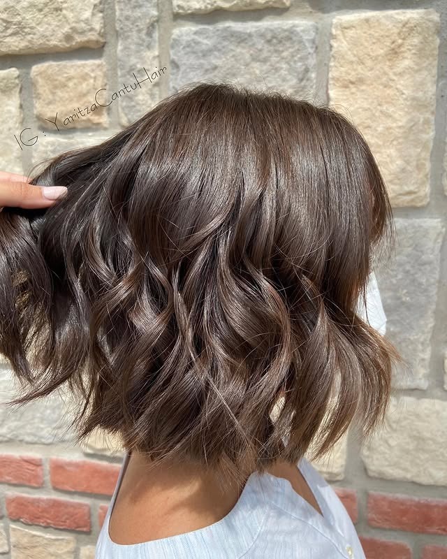 19. Glossy Brunette Blunt Bob with Defined Waves - Blunt Bob Hairstyles