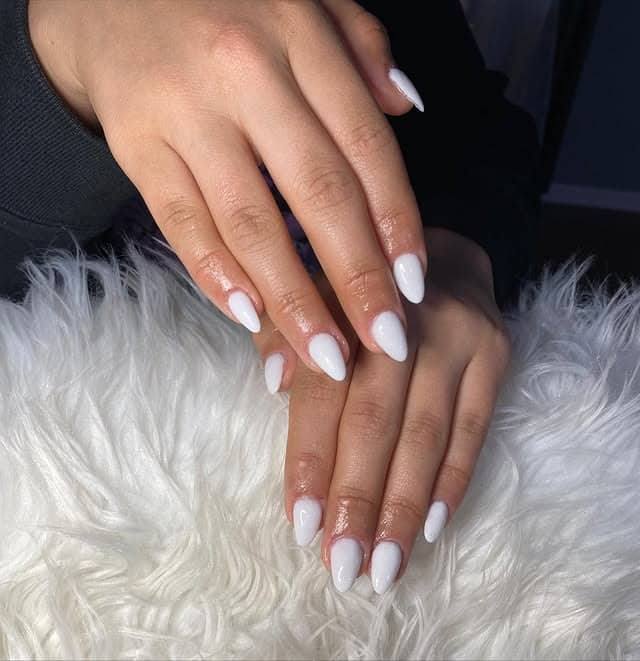 7. Glossy White Short Almond Nails - white short nail ideas