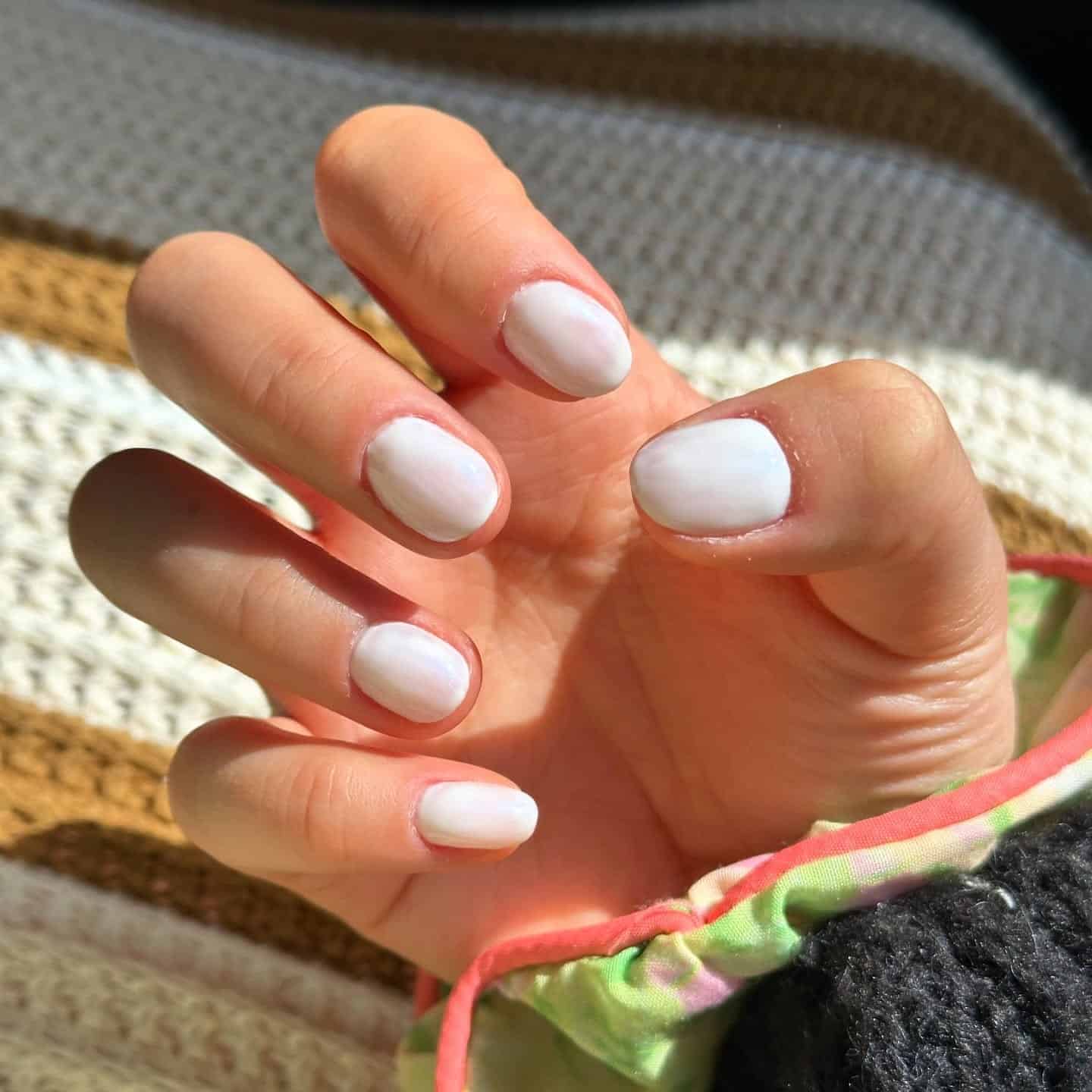 17. Short White Oval Nails with Natural Shine - white short nail ideas