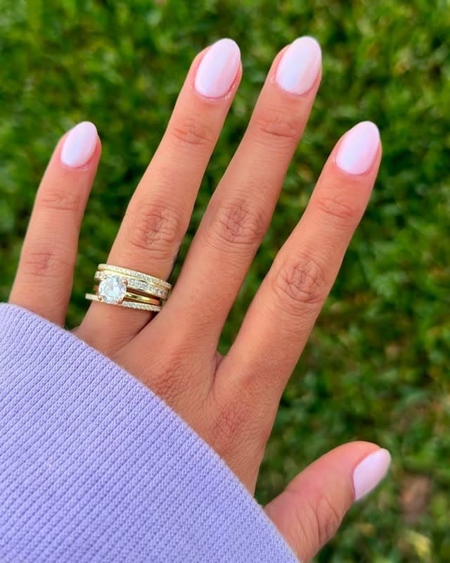 19. Pink-Toned White Short Almond Nails - white short nail ideas
