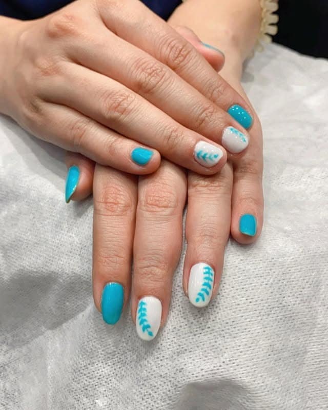 1. Aqua Blue Botanical Accent Nails - aqua blue nail ideas