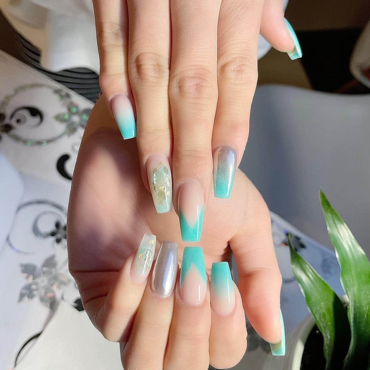 8. Aqua Blue Ombre Coffin Nails with Foil Accents - aqua blue nail ideas